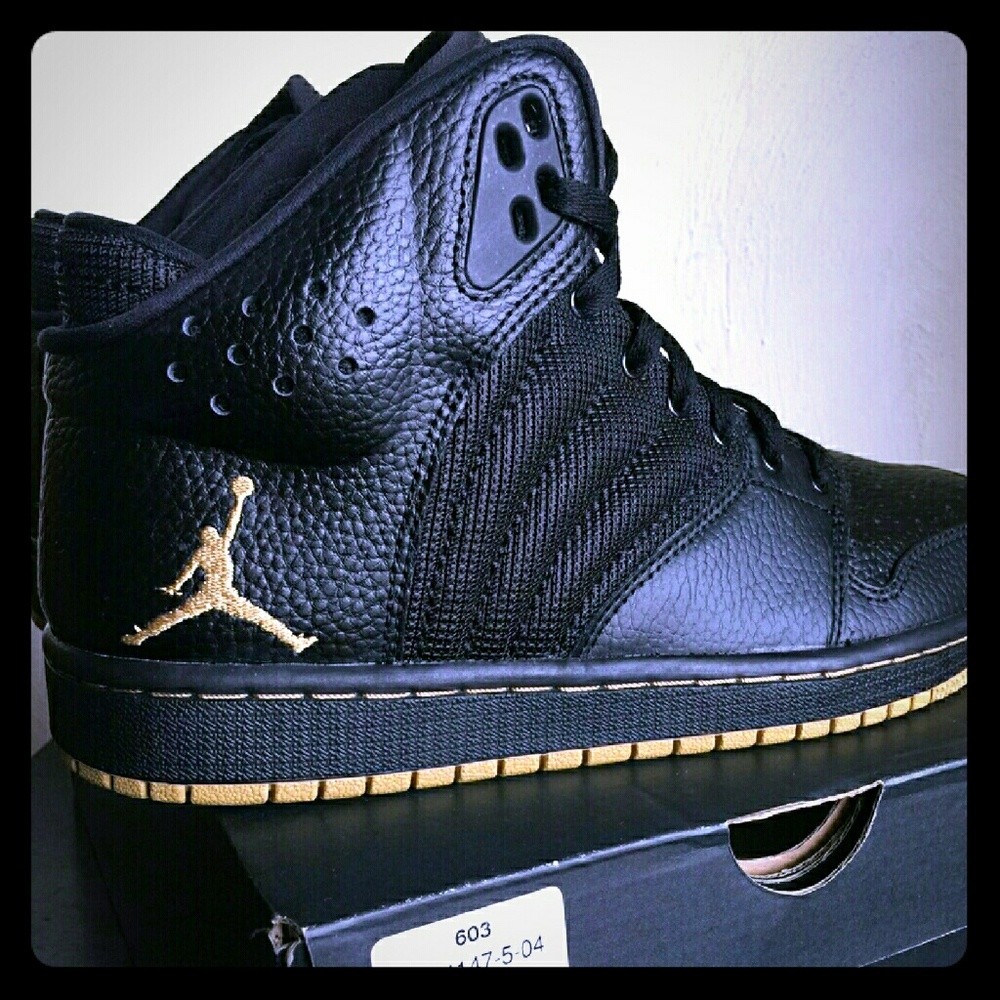 Black and Gold Jordan 1s